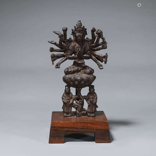 A copper thousand-armed Guanyin statue