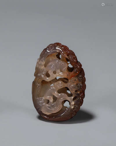 An agate monkey pendant