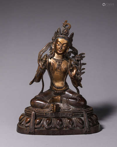 A copper buddha statue