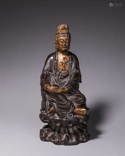 A gilt copper Guanyin statue