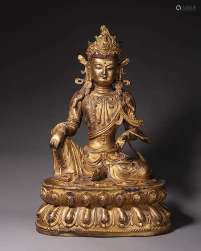 A gilding copper buddha statue