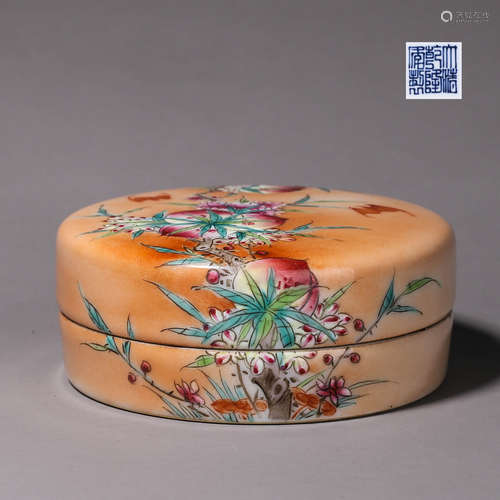 A famille rose bat and peach porcelain box