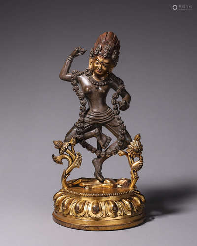 A gilding copper buddha statue