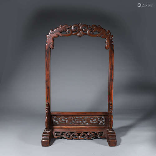 A boxwood carved stand