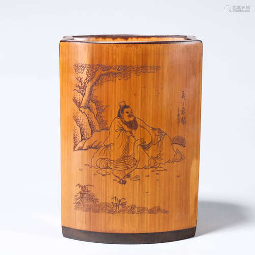 A carved figure bamboo brush pot