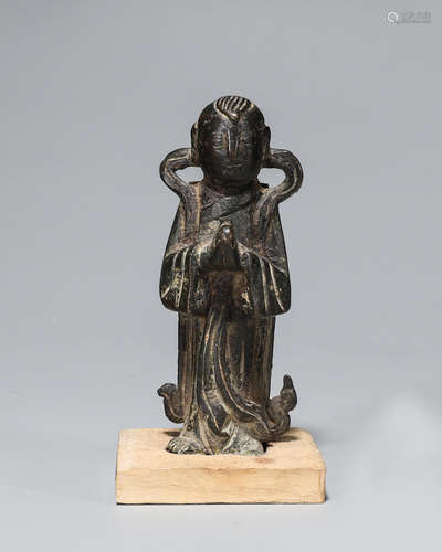 A copper figure statue