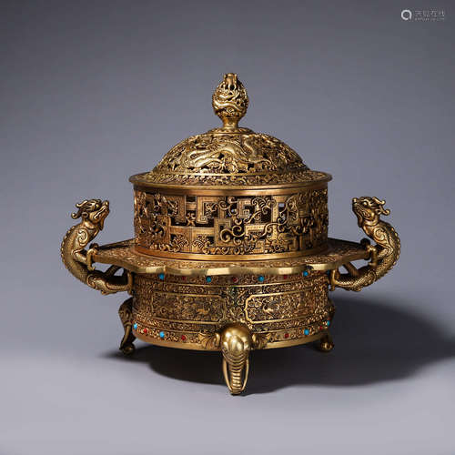 A hollowed out gilding copper censer with dragon shaped ears