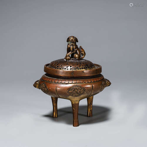 A three-legged double-eared copper incense burner