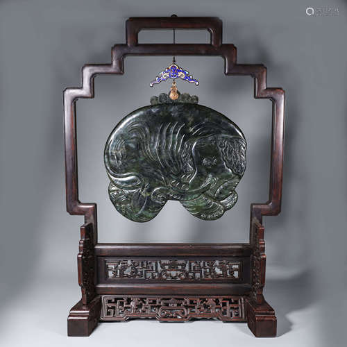 A jasper elephant hanging screen and a rosewood pedestal