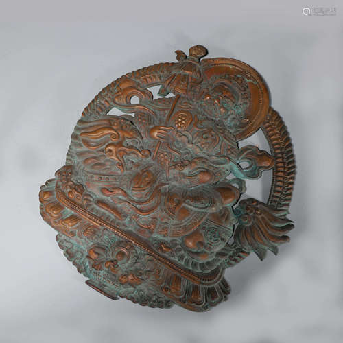 A copper carved ornament