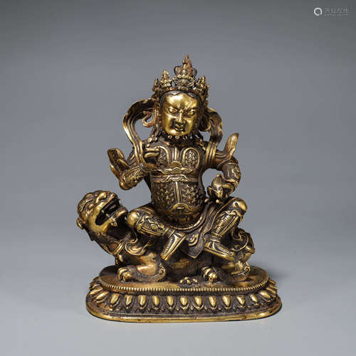 A gilding copper buddha statue