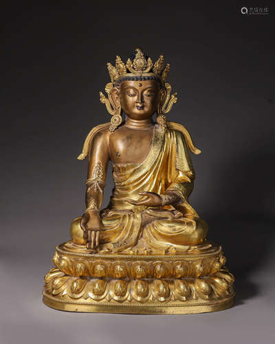 A gilding copper Sakyamuni buddha statue