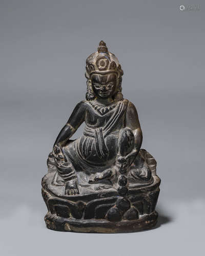 A stone carved buddha statue