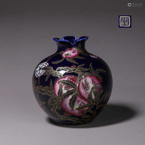 A famille rose gilt porcelain pomegranate zun