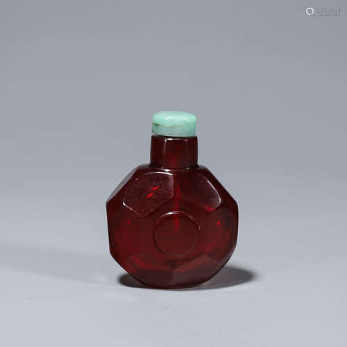 A red glass snuff bottle