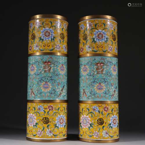 A pair of clear copper gilt painted enamel caps