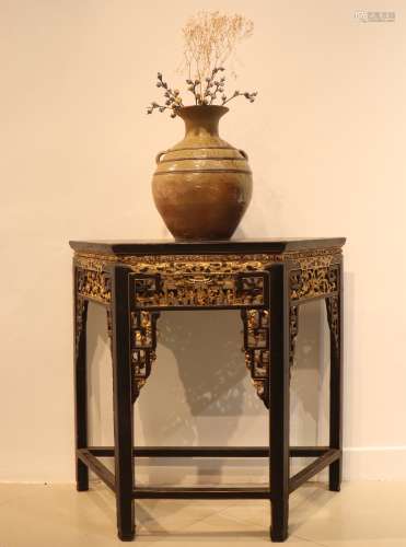 Chaozhou gold lacquer wood carving and a half-table in the Q...