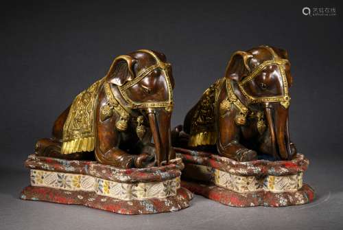 A PAIR OF QING DYNASTY GILT BRONZE ELEPHANT DECORATION