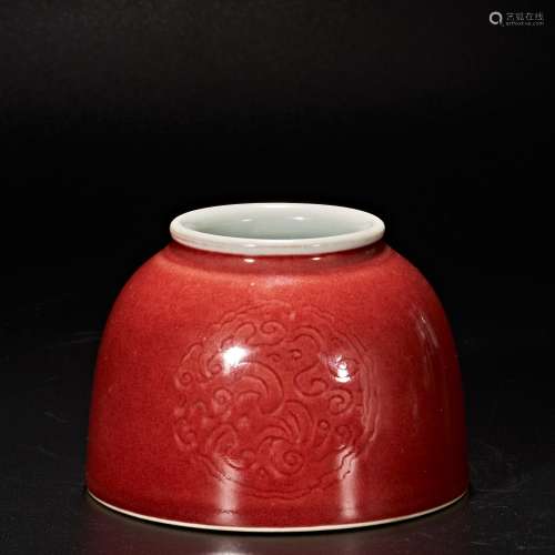 Red glazed water bowl with dark dragon pattern