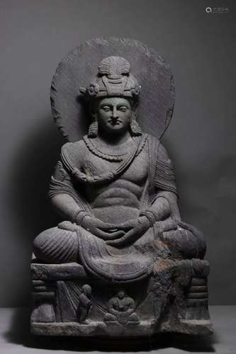 A GANDHARA SCHIST BUDDHA SITTING STATUE