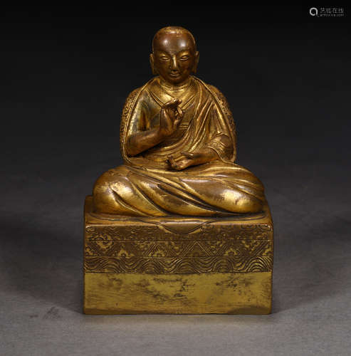 A MING DYNASTY GILT BRONZE MASTER BUDDHA STATUE