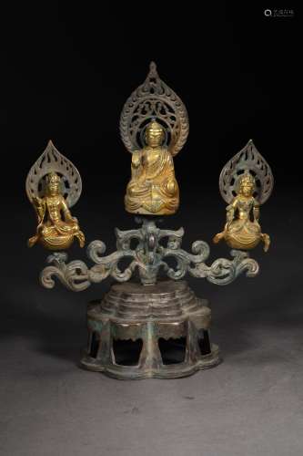 A TANG DYNASTY SILVER GILDING BUDDHAS OF THREE PERIODS