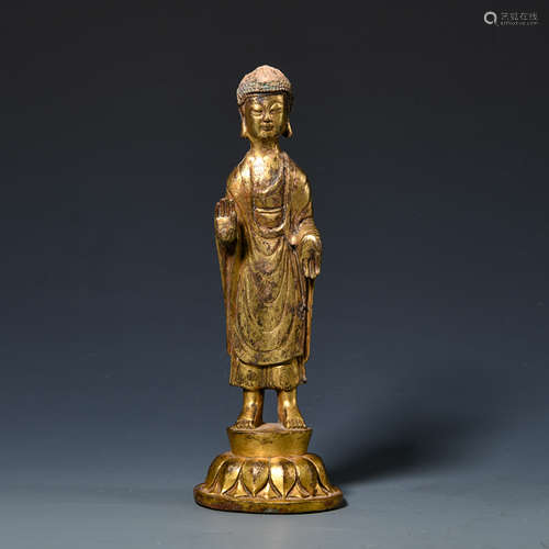 Bronze gilt standing Buddha