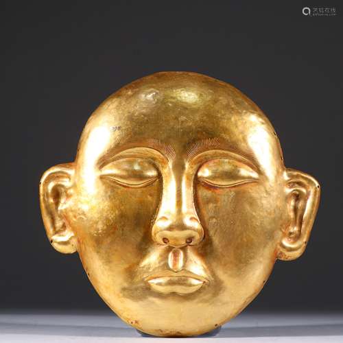 A TANG DYNASTY GILT SILVER MASK