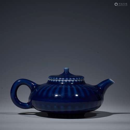 Sacrificial blue glazed teapot with orange petals