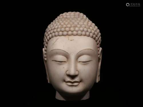 A NORTHERN QI DYNASTY WHITE MARBLE BUDDHA HEAD