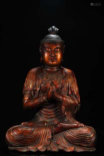 A YUAN DYNASTY LACQUER GOLD WOODEN BUDDHA STATUE