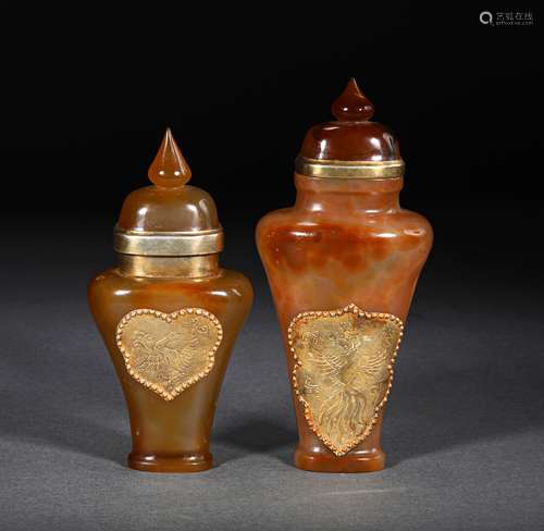 A PAIR OF LIAO DYNASTY AGATE GOLD FILLED BOTTLES