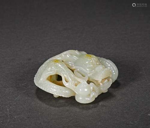 A MING DYNASTY HETIAN JADE DRAGON