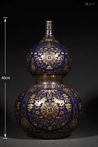 A QING DYNASTY JI BLUE GLAZE GOLD DRAWING GOURD BOTTLE