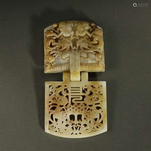 Jade ornaments with dragon and phoenix patterns carved in an...