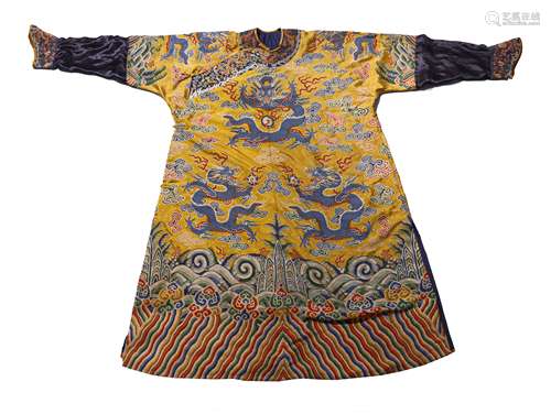 A QING DYNASTY YELLOW GROUND BROCADE DRAGON ROBE