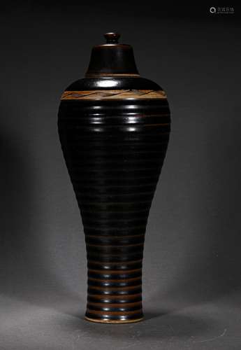 A SONG DYNASTY BLACK GLAZE PLUM BOTTLE