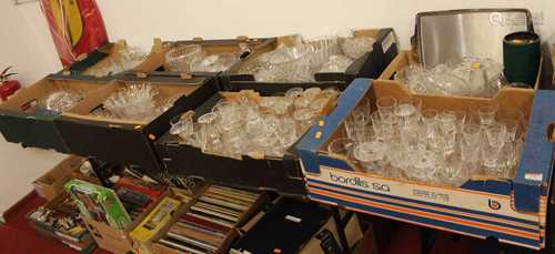 Eight boxes of cut and pressed glassware to include vases, d...