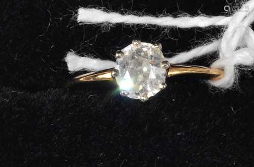 An 18ct gold diamond solitaire ring, the old round cut diamo...