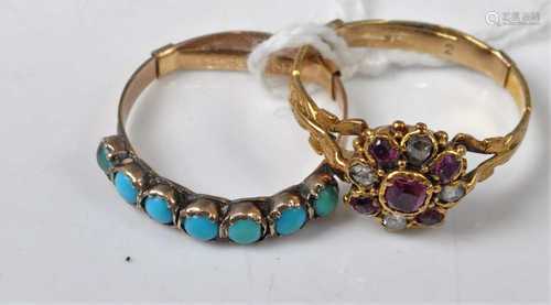 An early 20th century yellow metal, ruby and diamond flowerh...