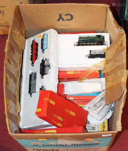 A box containing a collection of various Hornby 00 gauge wag...