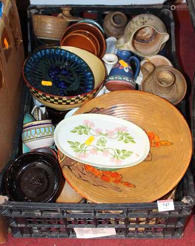 A box of ceramics to include a stoneware chamber stick, slip...