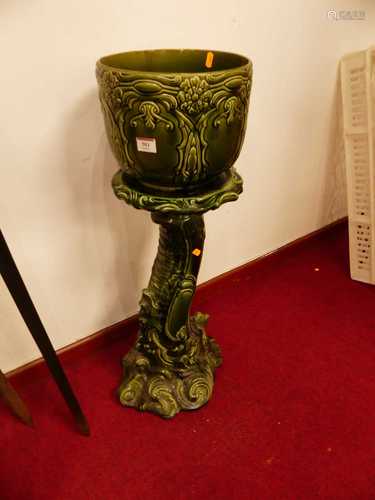 A Victorian green glazed jardiniere on stand, the associated...