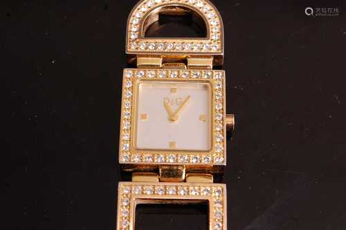 A Dolce & Gabbana lady's gilt metal dress watch, having mono...