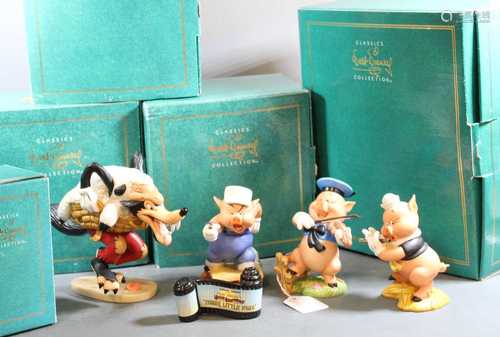 A set of four Walt Disney Classics Collection figures, The T...