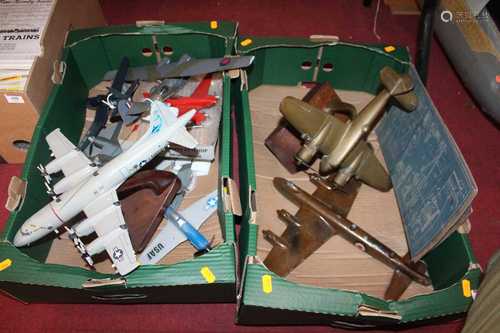 Two boxes containing a collection of model fighter jets to i...