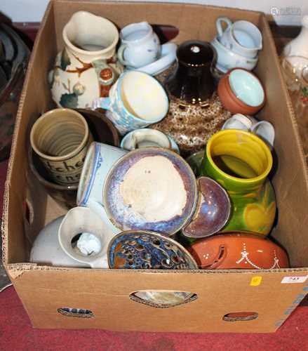 A box of ceramics to include a flambe glazed stoneware dish,...