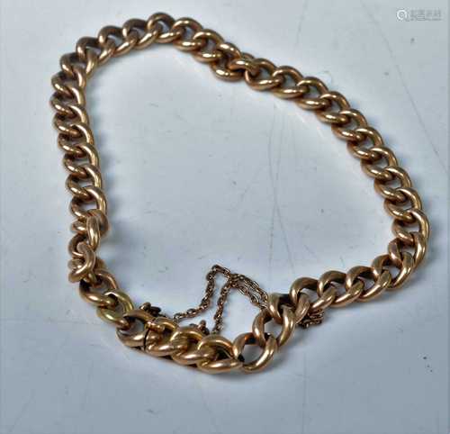 An Edwardian 15ct gold curblink bracelet, with safety chain,...