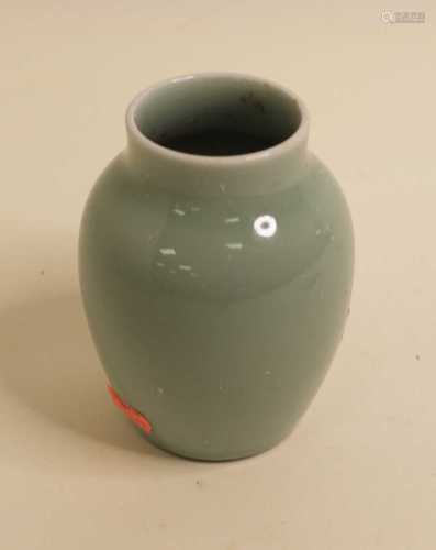 A Chinese export celadon glazed vase of squat baluster form ...