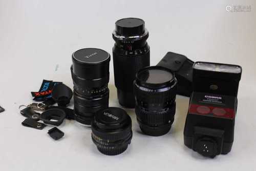 A collection of camera accessories, to include a Cobra 700AF...